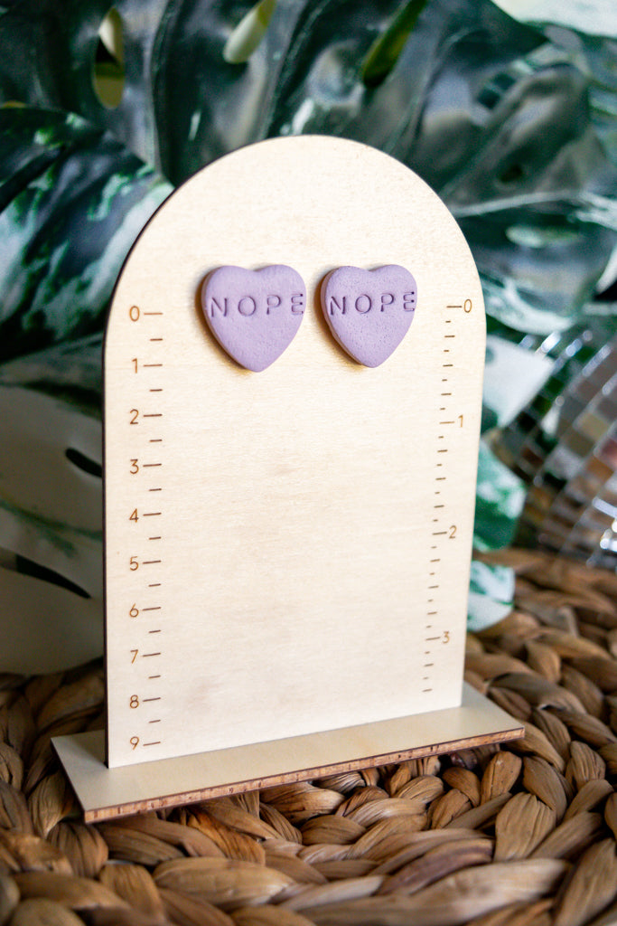 "nope" snarky heart studs