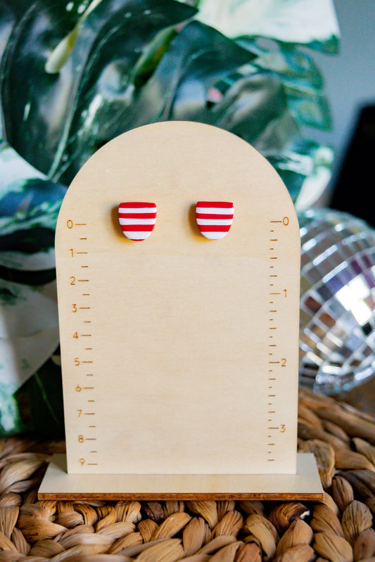 red and white striped studs