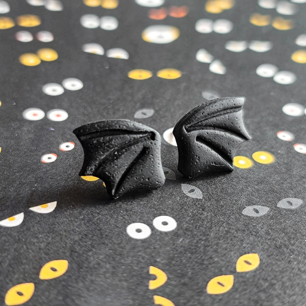 bat wing studs